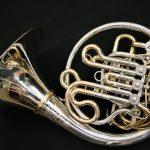 E. Schmid compensating triple
