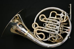 E. Schmid compensating triple